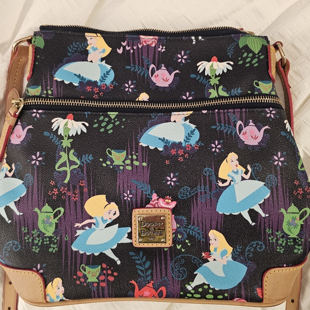 Dooney and Bourke Alice in Wonderland cross body purse